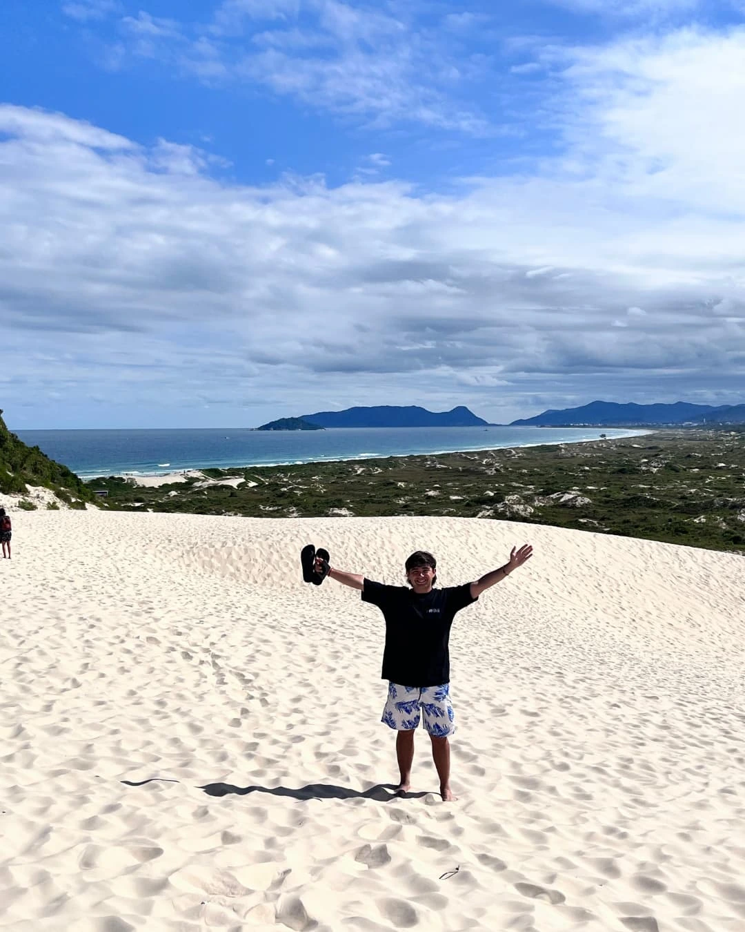 Picture of Francisco Martin at the dunes of the beach in Joaquina, Brasil.